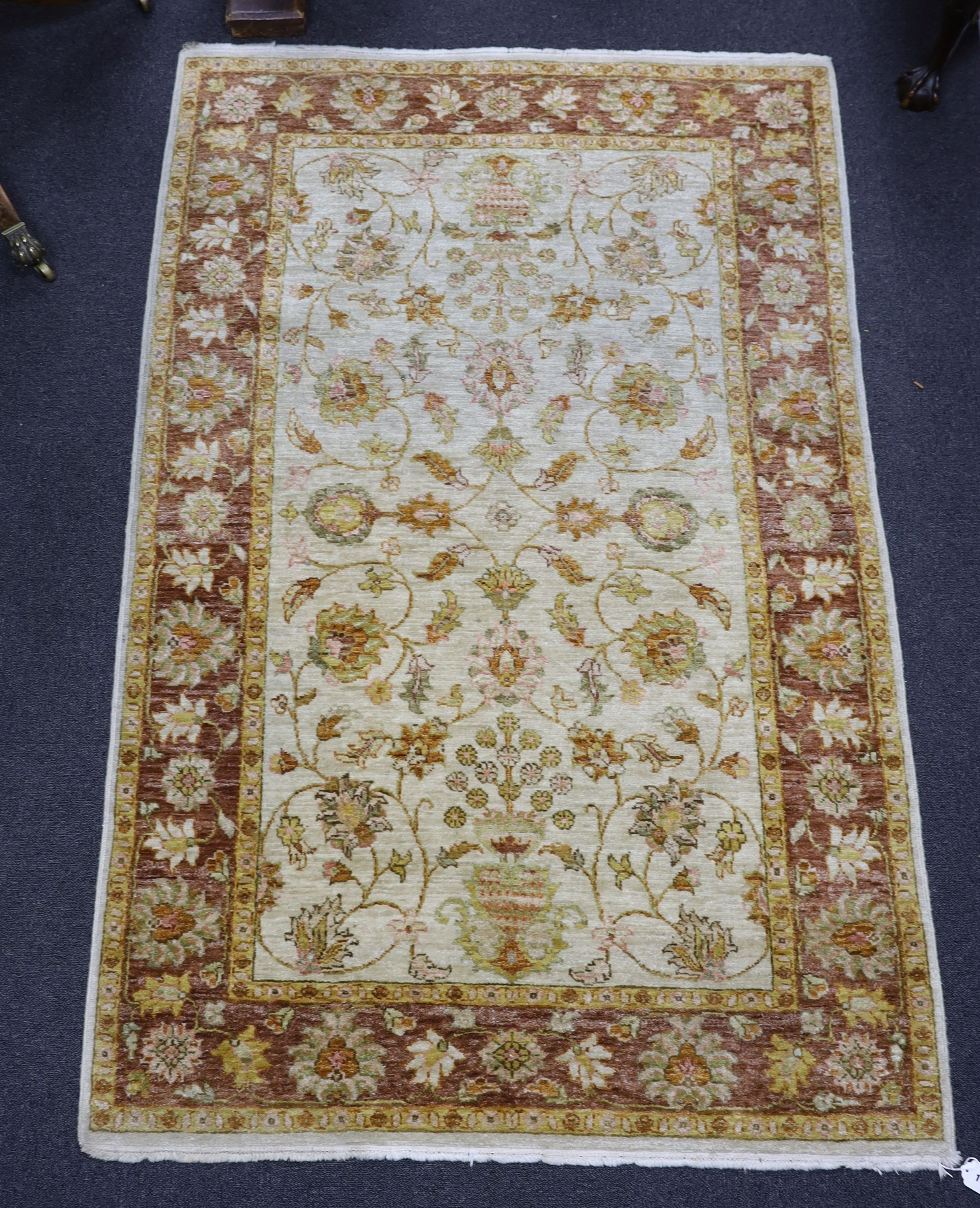 A Ziegler style ivory ground rug, 188 x 122cm